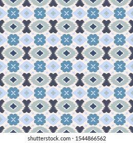 Ikat geometric folklore ornament with diamonds and flowers. African rug. Tribal ethnic vector texture. Seamless pattern in Aztec style. Folk embroidery. Indian batik. Mexican decor.