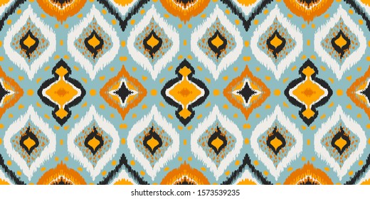 Ikat geometric folklore ornament with diamonds. Tribal ethnic vector texture. Seamless striped pattern in Aztec style. Folk embroidery. Indian, Scandinavian, Gypsy, Mexican, African rug. 