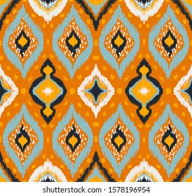 Ikat geometric folklore ornament with diamonds. Tribal ethnic vector texture. Seamless striped pattern in Aztec style. Folk embroidery. Indian, Scandinavian, Gypsy, Mexican, African rug. 