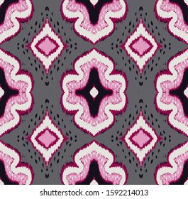 Ikat geometric folklore ornament with diamonds. Damask rug. Tribal ethnic vector texture. Persian geo print. Seamless pattern in Aztec style. Folk embroidery. Gypsy, Mexican, African print. 