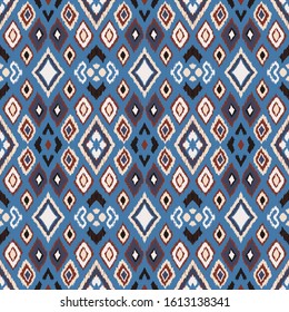 Ikat geometric folklore ornament with diamonds. Tribal ethnic vector texture. Seamless striped pattern in Aztec style. Folk embroidery. Indian, Scandinavian, Gypsy, Mexican, African rug. 