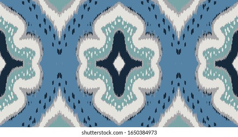 Ikat geometric folklore ornament with diamonds. Damask rug. Tribal ethnic vector texture. Persian geo print. Seamless pattern in Aztec style. Folk embroidery. Gypsy, Mexican, African print. 