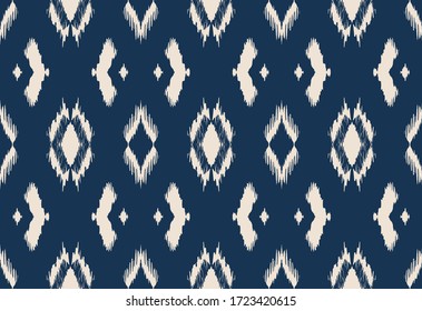 Ikat geometric folklore ornament with diamonds. Tribal ethnic vector texture. Seamless striped pattern in Aztec style. Folk embroidery. Indian, Scandinavian, Gypsy, Mexican, African rug.
