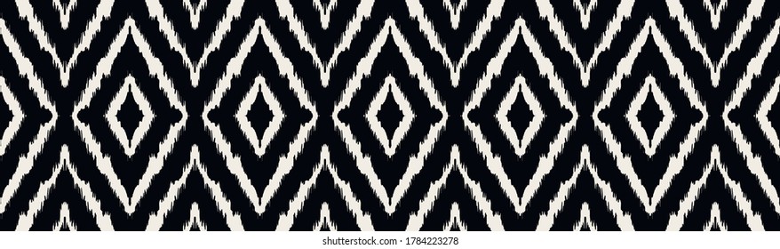 Ikat geometric folklore ornament with diamonds. Tribal ethnic vector texture. Seamless striped pattern in Aztec style. Folk embroidery. Indian, Scandinavian, Gypsy, Mexican, African rug.