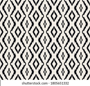 Ikat geometric folklore ornament with diamonds. Tribal ethnic vector texture. Seamless striped pattern in Aztec style. Folk embroidery. Indian, Scandinavian, Gypsy, Mexican, African rug.