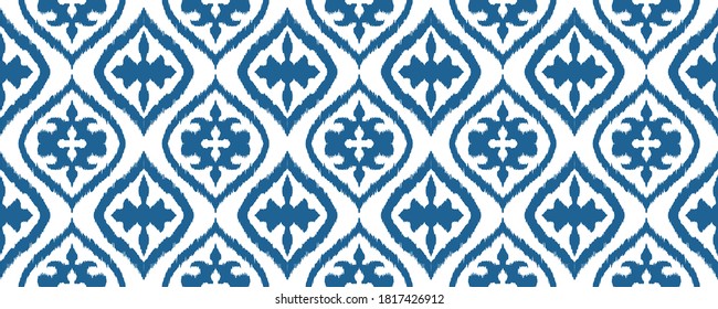 Ikat geometric folklore ornament with diamonds. Damask rug. Tribal ethnic vector texture. Persian geo print. Seamless pattern in Aztec style. Folk embroidery. Gypsy, Mexican, African print. 