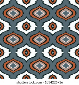 Ikat geometric folklore ornament with diamonds. Tribal ethnic vector texture. Seamless striped pattern in Aztec style. Folk embroidery. Indian, Scandinavian, Gypsy, Mexican, African rug. 