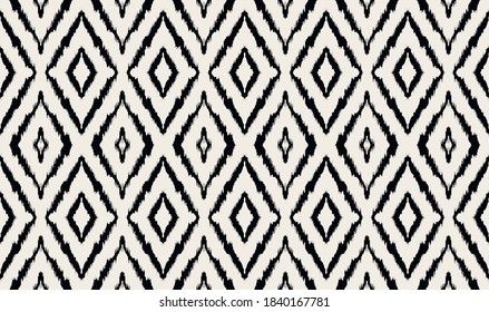 Ikat geometric folklore ornament with diamonds. Tribal ethnic vector texture. Seamless striped pattern in Aztec style. Folk embroidery. Indian, Scandinavian, Gypsy, Mexican, African rug.