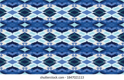 Ikat geometric folklore ornament with diamonds. Tribal ethnic vector texture. Seamless striped pattern in Aztec style. Folk embroidery. Indian, Scandinavian, Gypsy, Mexican, African rug.