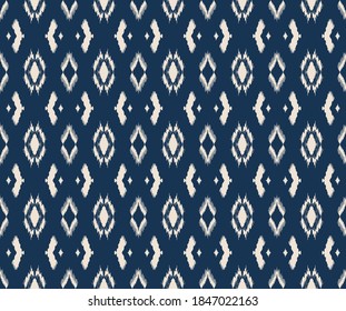 Ikat geometric folklore ornament with diamonds. Tribal ethnic vector texture. Seamless striped pattern in Aztec style. Folk embroidery. Indian, Scandinavian, Gypsy, Mexican, African rug.