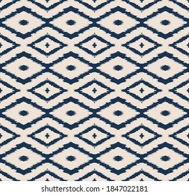 Ikat geometric folklore ornament with diamonds. Tribal ethnic vector texture. Seamless striped pattern in Aztec style. Folk embroidery. Indian, Scandinavian, Gypsy, Mexican, African rug.