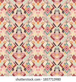 Ikat geometric folklore ornament with diamonds. Tribal ethnic vector texture. Seamless striped pattern in Aztec style. Folk embroidery. Indian, Scandinavian, Gypsy, Mexican, African rug. 