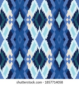 Ikat geometric folklore ornament with diamonds. Tribal ethnic vector texture. Seamless striped pattern in Aztec style. Folk embroidery. Indian, Scandinavian, Gypsy, Mexican, African rug.