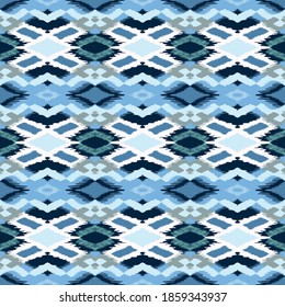 Ikat geometric folklore ornament with diamonds. Tribal ethnic vector texture. Seamless striped pattern in Aztec style. Folk embroidery. Indian, Scandinavian, Gypsy, Mexican, African rug.