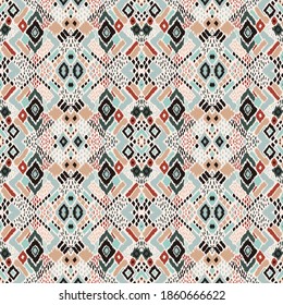 Ikat geometric folklore ornament with diamonds. Tribal ethnic vector texture. Seamless striped pattern in Aztec style. Folk embroidery. Indian, Scandinavian, Gypsy, Mexican, African rug. 