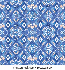 Ikat geometric folklore ornament with diamonds. Tribal ethnic vector texture. Seamless striped pattern in Aztec style. Folk embroidery. Indian, Scandinavian, Gypsy, Mexican, African rug. 