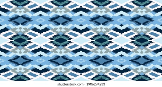 Ikat geometric folklore ornament with diamonds. Tribal ethnic vector texture. Seamless striped pattern in Aztec style. Folk embroidery. Indian, Scandinavian, Gypsy, Mexican, African rug.