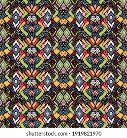 Ikat geometric folklore ornament with diamonds. Tribal ethnic vector texture. Seamless striped pattern in Aztec style. Folk embroidery. Indian, Scandinavian, Gypsy, Mexican, African rug. 