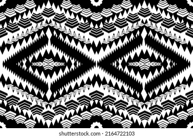 Ikat geometric folklore ornament with diamonds. Tribal ethnic vector texture. Seamless striped pattern in Aztec style. Folk embroidery. Indian, Scandinavian, Gypsy, Mexican, African rug.