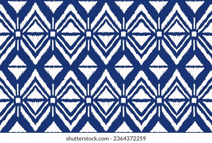 Ikat geometric folklore ornament with diamonds. Tribal ethnic vector texture. Seamless striped pattern in Aztec style. Folk embroidery. Indian, Scandinavian, Gypsy, Mexican, African rug.
