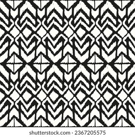 Ikat geometric folklore ornament with diamonds. Tribal ethnic vector texture. Seamless striped pattern in Aztec style. Folk embroidery. Indian, Scandinavian, Gypsy, Mexican, African rug.