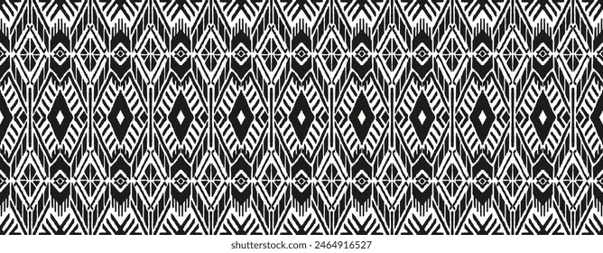 Ikat geometric folklore ornament with diamonds. Tribal ethnic vector texture. Seamless striped pattern in Aztec style. Folk embroidery. Indian, Scandinavian, Gypsy, Mexican, African rug.
