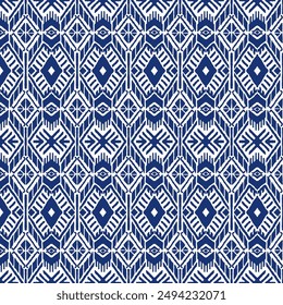 Ikat geometric folklore ornament with diamonds. Tribal ethnic vector texture. Seamless striped pattern in Aztec style. Folk embroidery. Indian, Scandinavian, Gypsy, Mexican, African rug.
