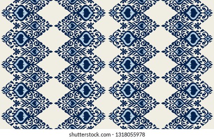 Ikat geometric folklore ornament. Oriental vector damask pattern. Ancient art of Arabesque. Tribal ethnic texture. Spanish motif on the carpet.  Aztec style.  Indian rug. Gypsy, Mexican  embroidery.