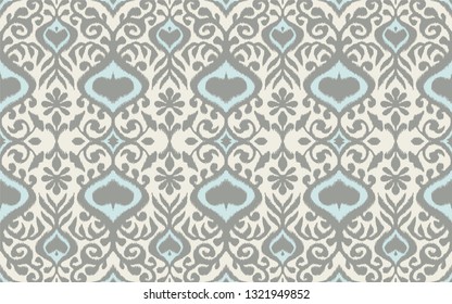 Ikat geometric folklore ornament. Oriental vector damask pattern. Ancient art of Arabesque. Tribal ethnic texture. Spanish motif on the carpet.  Aztec style.  Indian rug. Gypsy, Mexican  embroidery.