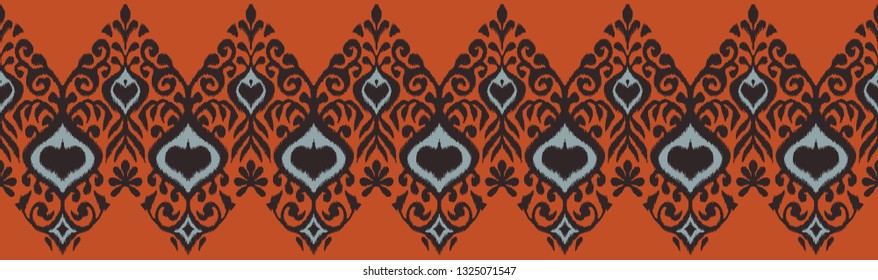 Ikat geometric folklore ornament. Oriental vector damask pattern. Ancient art of Arabesque. Tribal ethnic texture. Spanish motif on the carpet.  Aztec style.  Indian rug. Gypsy, Mexican  embroidery.