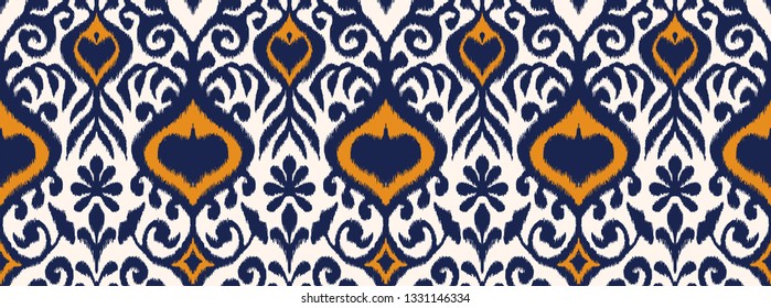 Ikat geometric folklore ornament. Oriental vector damask pattern. Ancient art of Arabesque. Tribal ethnic texture. Spanish motif on the carpet.  Aztec style.  Indian rug. Gypsy, Mexican  embroidery.