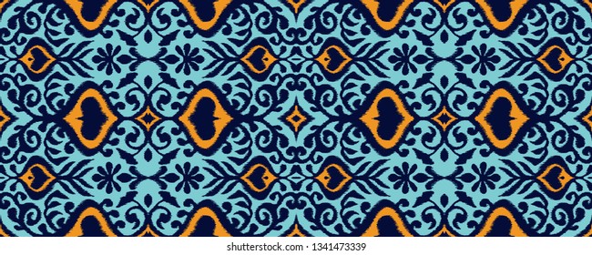 Ikat geometric folklore ornament. Oriental vector damask pattern. Ancient art of Arabesque. Tribal ethnic texture. Spanish motif on the carpet.  Aztec style.  Indian rug. Gypsy, Mexican  embroidery.