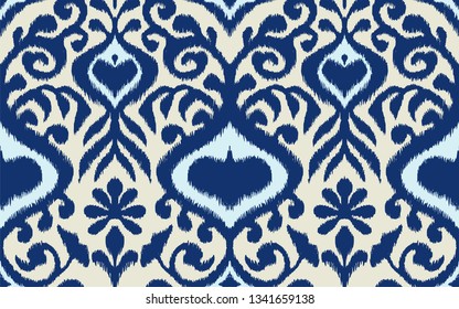 Ikat geometric folklore ornament. Oriental vector damask pattern. Ancient art of Arabesque. Tribal ethnic texture. Spanish motif on the carpet.  Aztec style.  Indian rug. Gypsy, Mexican  embroidery.