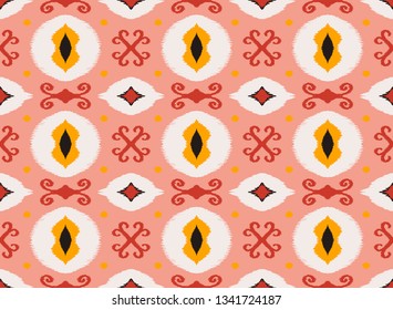 Ikat geometric folklore ornament. Oriental vector damask pattern. Ancient art of Arabesque. Tribal ethnic texture. Spanish motif on the carpet.  Aztec style.  Indian rug. Gypsy, Mexican  embroidery.