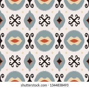 Ikat geometric folklore ornament. Oriental vector damask pattern. Ancient art of Arabesque. Tribal ethnic texture. Spanish motif on the carpet.  Aztec style.  Indian rug. Gypsy, Mexican  embroidery.