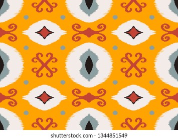 Ikat geometric folklore ornament. Oriental vector damask pattern. Ancient art of Arabesque. Tribal ethnic texture. Spanish motif on the carpet.  Aztec style.  Indian rug. Gypsy, Mexican  embroidery.