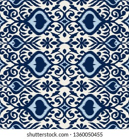 Ikat geometric folklore ornament. Oriental vector damask pattern. Ancient art of Arabesque. Tribal ethnic texture. Spanish motif on the carpet.  Aztec style.  Indian rug. Gypsy, Mexican  embroidery.