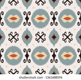 Ikat geometric folklore ornament. Oriental vector damask pattern. Ancient art of Arabesque. Tribal ethnic texture. Spanish motif on the carpet.  Aztec style.  Indian rug. Gypsy, Mexican  embroidery.