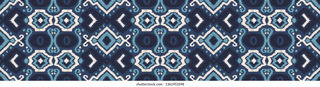 Ikat geometric folklore ornament. Oriental vector damask pattern. Ancient art of Arabesque. Tribal ethnic texture. Spanish motif on the carpet.  Aztec style.  Indian rug. Gypsy, Mexican  embroidery.