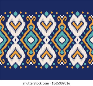 Ikat geometric folklore ornament. Oriental vector damask pattern. Ancient art of Arabesque. Tribal ethnic texture. Spanish motif on the carpet.  Aztec style.  Indian rug. Gypsy, Mexican  embroidery.