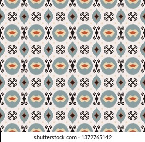 Ikat geometric folklore ornament. Oriental vector damask pattern. Ancient art of Arabesque. Tribal ethnic texture. Spanish motif on the carpet.  Aztec style.  Indian rug. Gypsy, Mexican  embroidery.