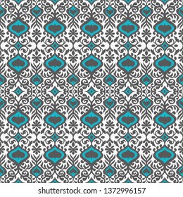 Ikat geometric folklore ornament. Oriental vector damask pattern. Ancient art of Arabesque. Tribal ethnic texture. Spanish motif on the carpet.  Aztec style.  Indian rug. Gypsy, Mexican  embroidery.