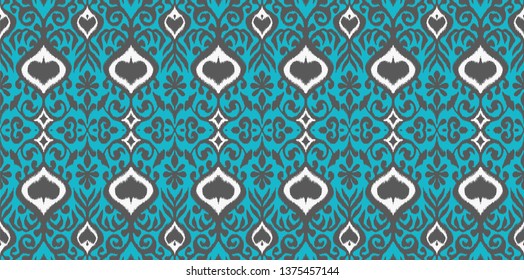 Ikat geometric folklore ornament. Oriental vector damask pattern. Ancient art of Arabesque. Tribal ethnic texture. Spanish motif on the carpet.  Aztec style.  Indian rug. Gypsy, Mexican  embroidery.