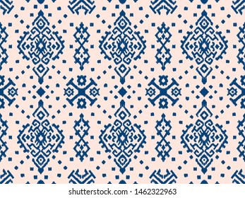 Ikat geometric folklore ornament. Oriental vector damask pattern. Ancient art of Arabesque. Tribal ethnic texture. Spanish motif on the carpet. Aztec style. Indian rug. Gypsy, Mexican embroidery.O