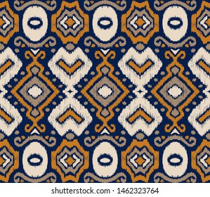 Ikat geometric folklore ornament. Oriental vector damask pattern. Ancient art of Arabesque. Tribal ethnic texture. Spanish motif on the carpet. Aztec style. Indian rug. Gypsy, Mexican embroidery.