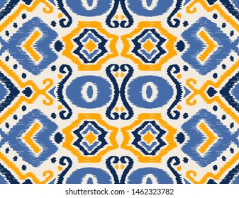 Ikat geometric folklore ornament. Oriental vector damask pattern. Ancient art of Arabesque. Tribal ethnic texture. Spanish motif on the carpet. Aztec style. Indian rug. Gypsy, Mexican embroidery.