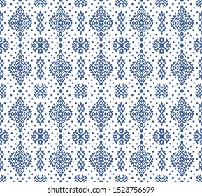 Ikat geometric folklore ornament. Oriental vector damask pattern. Ancient art of Arabesque. Tribal ethnic texture. Spanish motif on the carpet. Aztec style. Indian rug. Gypsy, Mexican embroidery.