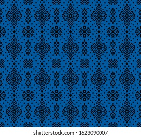 Ikat geometric folklore ornament. Oriental vector damask pattern. Ancient art of Arabesque. Tribal ethnic texture. Spanish motif on the carpet. Aztec style. Indian rug. Gypsy, Mexican embroidery.