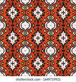 Ikat geometric folklore ornament. Oriental vector damask pattern. Ancient art of Arabesque. Tribal ethnic texture with heart. Spanish  carpet. Aztec style. Indian rug. Gypsy, Mexican embroidery.