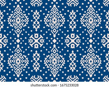 Ikat geometric folklore ornament. Oriental vector damask pattern. Ancient art of Arabesque. Tribal ethnic texture. Spanish motif on the carpet. Aztec style. Indian rug. Gypsy, Mexican embroidery.O